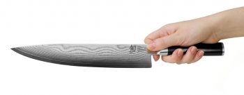 DM0707 Kai Shun Classic Chefs Knife 25cm Holding