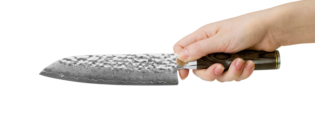 TDM0702 Kai Shun Premier Santoku Knife 18cm Holding
