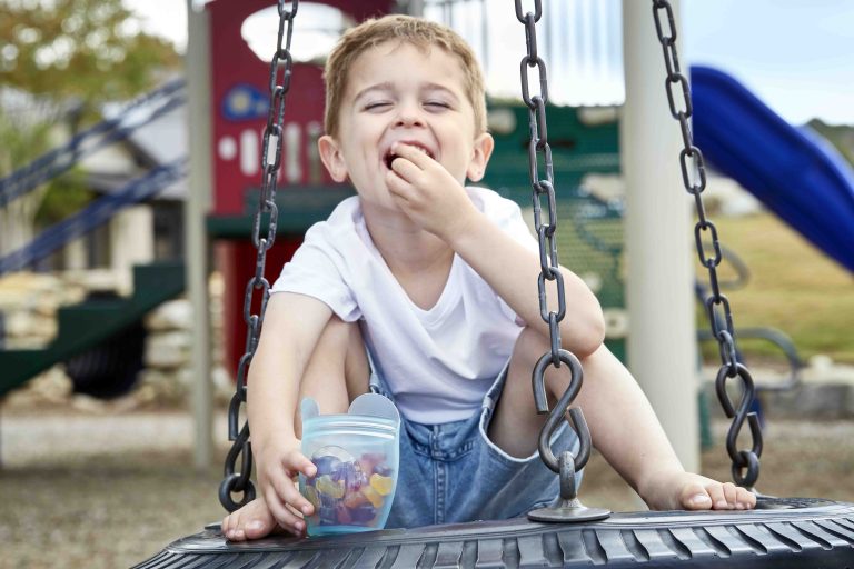 20191106_115326_1 Teal bear gummy bears boy on tire swing copy