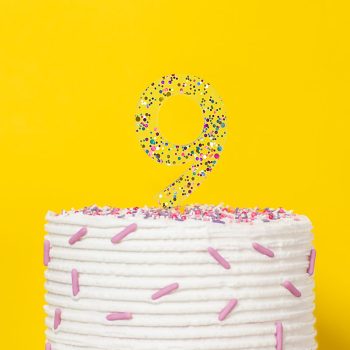 0421_CC_Number_9_Rainbow_Glitter_Acrylic_Cake-Toppers_lifestyle_yellow