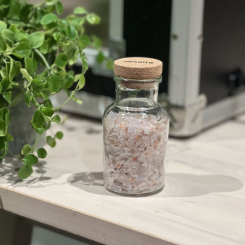 Rivsalt Crush Rock Salt Blend on a table outdoors in the sun.