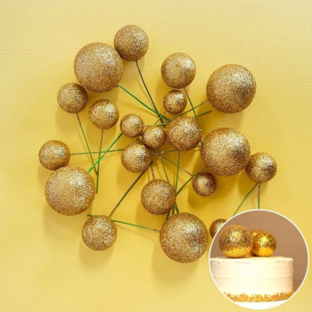 Gold Foam Ball Decorations on a yellow background.