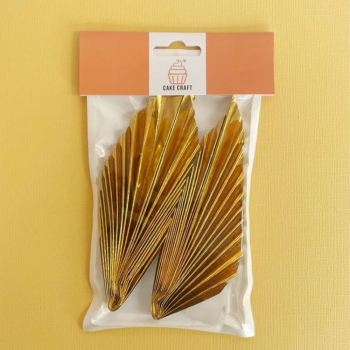 Wish Deco Fan Topper Gold in packaging on a gold background.