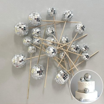 Disco Foam Ball Deco in a pile on a grey background.
