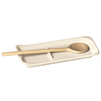 Emile Henry Spoon Rest Clay on a white background with a wooden spoon resting on it.